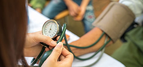 checking blood pressure